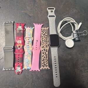 Apple Watch with Gray, Red, Pink, and Leopard Bands well loved Apple Watch 7